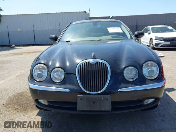 2003 Jaguar S-Type with VIN SAJEA01T13FM70486, listed as a IAAI auction lot 41989501 with 100,109 mi miles and . Bid and sale history available at DreamBid. Image 12.