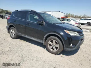 2015 Toyota RAV4 XLE with VIN 2T3WFREV9FW218394, listed as a Copart auction lot 50728245 with 137,586 mi miles and Salvage Title. Bid and sale history available at carsss.com. Image 4.