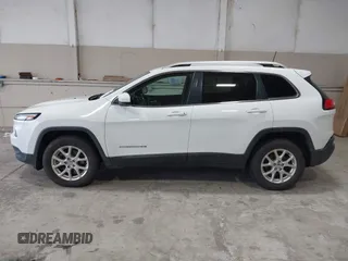 2016 Jeep Cherokee Latitude with VIN 1C4PJMCS5GW341286, listed as a IAAI auction lot 40723940 with 113,040 mi miles and . Bid and sale history available at DreamBid. Image 14.