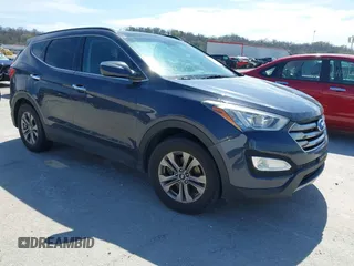 2016 Hyundai Santa Fe z VIN 5XYZU3LB1GG361252, wystawiony jako IAAI lot #41909071 z przebiegiem 166 137 mil mil oraz . Historia ofert i sprzedaży dostępna na DreamBid. Obrazek 1.