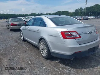 2013 Ford Taurus Limited with VIN 1FAHP2F87DG235392, listed as a IAAI auction lot 42700160 with 123,904 mi miles and . Bid and sale history available at DreamBid. Image 3.
