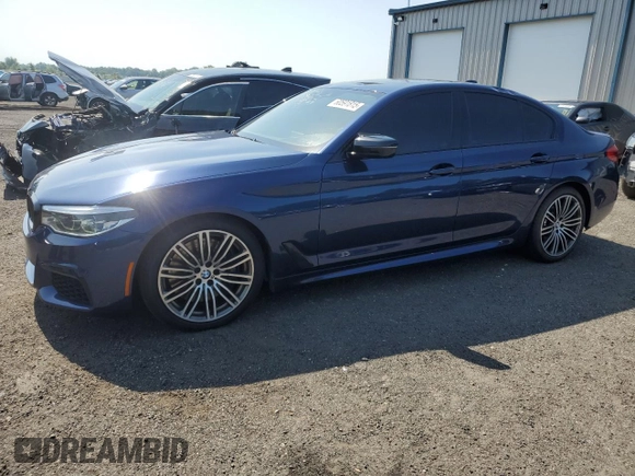 2020 BMW 5 Series M550i xDrive with VIN WBAJS7C0XLBN96338, listed as a Copart auction lot 60591815 with 73,910 mi miles and Salvage title. Bid and sale history available at DreamBid. Image 1.