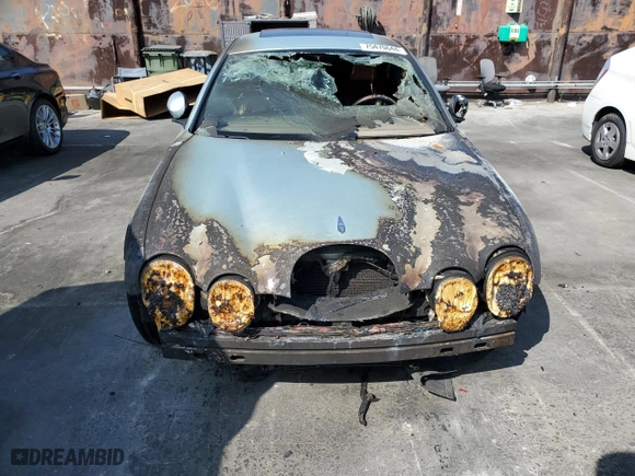 2003 Jaguar S-Type with VIN SAJEA01T93FM59607, listed as a Copart auction lot 75470644 with NaN miles and Salvage Title. Bid and sale history available at carsss.com. Image 5.