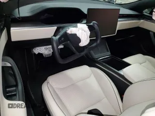 2022 Tesla Model S Plaid с VIN 5YJSA1E65NF487665, выставлен на аукционе Copart как лот 55261025 с пробегом Не указан миль и Списание • Salvage title. История ставок и продаж доступна на DreamBid. Изображение 8.