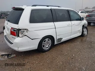 2007 Honda Odyssey EX-L z VIN 5FNRL38737B072789, wystawiony jako IAAI lot #41203148 z przebiegiem 156 828 mil mil oraz . Historia ofert i sprzedaży dostępna na DreamBid. Obrazek 4.