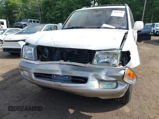 2000 Toyota Land Cruiser z VIN JT3HT05J4Y0084531, wystawiony jako IAAI lot #42381507 z przebiegiem 184 478 mil mil oraz . Historia ofert i sprzedaży dostępna na DreamBid. Obrazek 6.