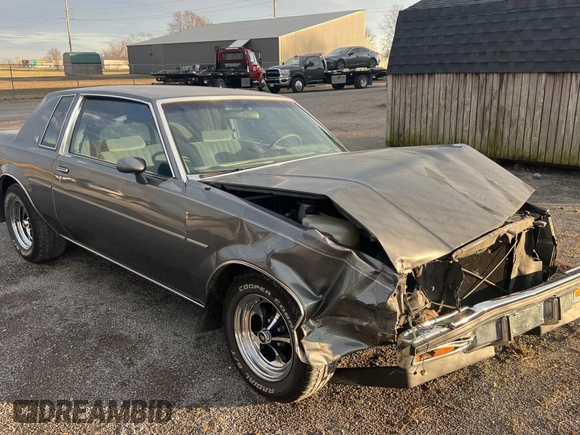 1987 Buick Regal with VIN 1G4GJ11Y4HP413978, listed as a Copart auction lot 87311954 with 52,519 mi miles and Salvage Title. Bid and sale history available at DreamBid. Image 1.