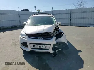 2016 Ford Escape Titanium with VIN 1FMCU0J99GUB83458, listed as a Copart auction lot 48828195 with 74,250 mi miles and Salvage Title. Bid and sale history available at carsss.com. Image 11.