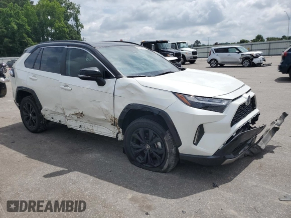 2022 Toyota RAV4 Hybrid XSE with VIN 2T3E6RFVXNW031612, listed as a Copart auction lot 60544055 with 99,831 mi miles and Salvage title. Bid and sale history available at DreamBid. Image 4.