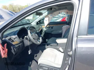 2017 Honda CR-V EX with VIN 2HKRW2H5XHH678674, listed as a IAAI auction lot 42039505 with 124,891 mi miles. Bid and sale history available at carsss.com. Image 5.