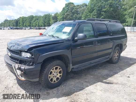 2004 Chevrolet Suburban Z71 z VIN 3GNFK16Z74G158523, wystawiony jako IAAI lot #42495502 z przebiegiem 303 931 mil mil oraz . Historia ofert i sprzedaży dostępna na DreamBid. Obrazek 2.
