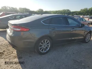 2017 Ford Fusion SE z VIN 3FA6P0HD6HR156834, wystawiony jako Copart lot #55144955 z przebiegiem 114 497 mil mil oraz Szkoda całkowita • Salvage title. Historia ofert i sprzedaży dostępna na DreamBid. Obrazek 3.