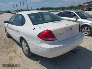 2006 Ford Taurus SE with VIN 1FAHP532X6A257510, listed as a IAAI auction lot 41892422 with 130,633 mi miles. Bid and sale history available at carsss.com. Image 3.