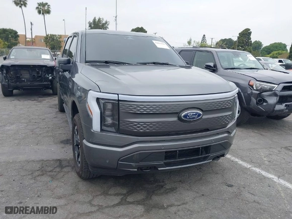 2023 Ford F-150 Lightning Pro with VIN 1FTVW1EL8PWG48559, listed as a IAAI auction lot 42033123 with 8,845 mi miles. Bid and sale history available at carsss.com. Image 1.