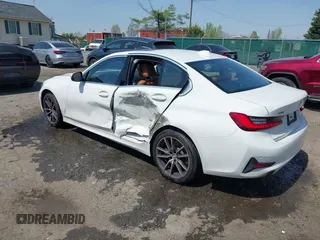 2019 BMW 3 Series 330i xDrive with VIN WBA5R7C54KAJ79214, listed as a IAAI auction lot 42001361 with 103,265 mi miles. Bid and sale history available at carsss.com. Image 3.