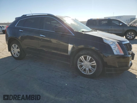 2014 Cadillac SRX Luxury Collection with VIN 3GYFNBE3XES631133, listed as a Copart auction lot 83394904 with 196,024 mi miles and Salvage Title. Bid and sale history available at carsss.com. Image 4.