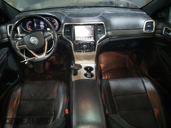 2015 Jeep Grand Cherokee Overland with VIN 1C4RJFCT2FC613502, listed as a Copart auction lot 89207005 with 124,482 mi miles and Salvage Title. Bid and sale history available at carsss.com. Image 8.