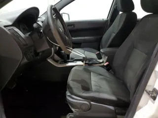 2010 Ford Focus SE with VIN 1FAHP3FNXAW290609, listed as a Copart auction lot 48481025 with 148,675 mi miles and Clean Title. Bid and sale history available at carsss.com. Image 7.