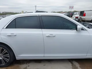 2013 Chrysler 300 with VIN 2C3CCABGXDH735739, listed as a IAAI auction lot 41282492 with 121,487 mi miles. Bid and sale history available at carsss.com. Image 14.