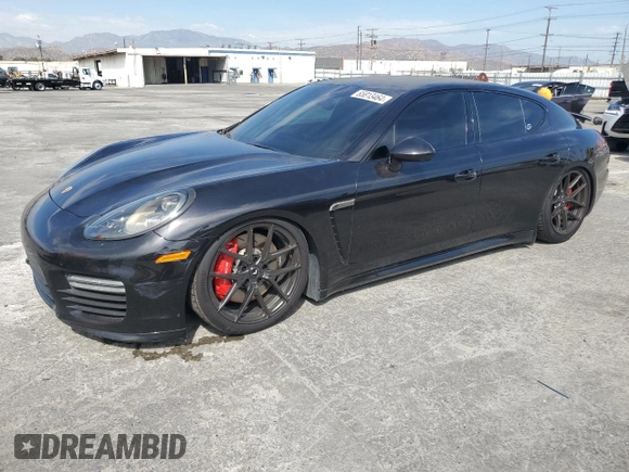 2014 Porsche Panamera Turbo z VIN WP0AC2A72EL073234, wystawiony jako Copart lot #65813464 z przebiegiem 83 918 mil mil oraz Szkoda całkowita • Salvage title. Historia ofert i sprzedaży dostępna na DreamBid. Obrazek 1.