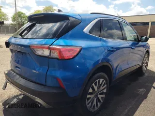2021 Ford Escape Titanium с VIN 1FMCU9J90MUA58591, выставлен на аукционе Copart как лот 57126875 с пробегом 109 483 миль миль и Списание • Salvage title. История ставок и продаж доступна на DreamBid. Изображение 3.