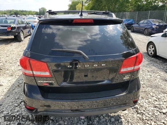 2015 Dodge Journey SXT with VIN 3C4PDCCG4FT697505, listed as a Copart auction lot 64888554 with 191,653 mi miles and Salvage title. Bid and sale history available at DreamBid. Image 6.