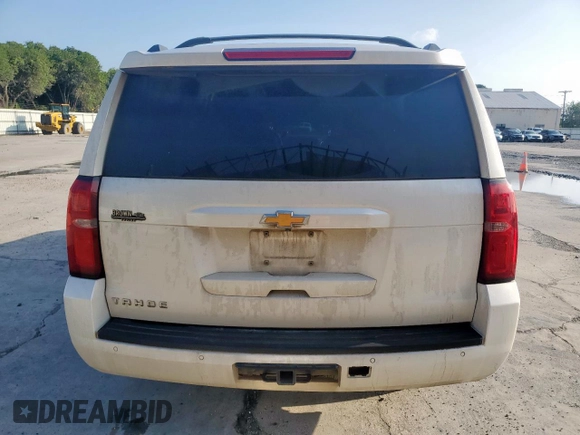 2015 Chevrolet Tahoe LT with VIN 1GNSCBKC1FR714895, listed as a Copart auction lot 60787185 with 239,815 mi miles and Salvage title. Bid and sale history available at DreamBid. Image 6.