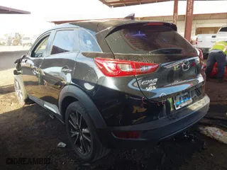 2016 Mazda CX-3 Grand Touring with VIN JM1DKBD75G0104797, listed as a IAAI auction lot 41511240 with 105,383 mi miles. Bid and sale history available at carsss.com. Image 3.