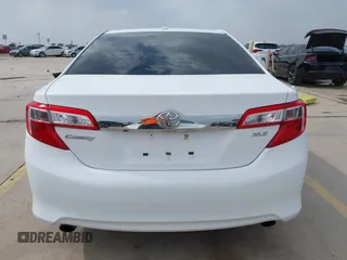 2014 Toyota Camry SE with VIN 4T1BK1FK5EU551196, listed as a IAAI auction lot 41912297 with 104,445 mi miles. Bid and sale history available at carsss.com. Image 16.