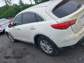 2014 Infiniti QX70 z VIN JN8CS1MU7EM451246, wystawiony jako IAAI lot #42221306 z przebiegiem 190 252 mil mil oraz . Historia ofert i sprzedaży dostępna na DreamBid. Obrazek 14.
