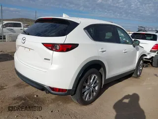 2019 Mazda CX-5 Grand Touring with VIN JM3KFBDM8K0518576, listed as a IAAI auction lot 41854296 with 88,706 mi miles and . Bid and sale history available at carsss.com. Image 4.