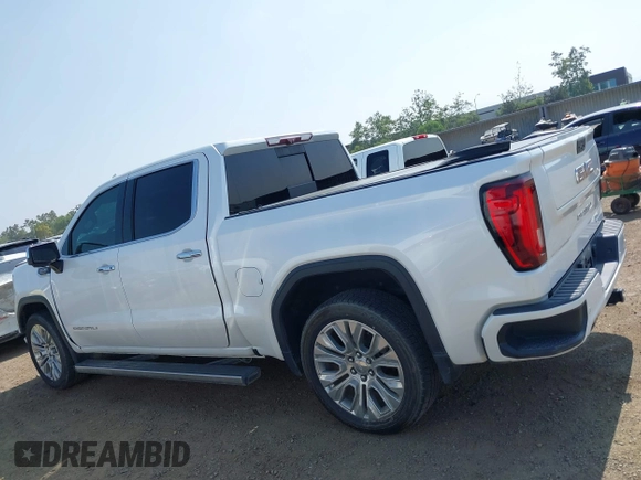 2021 GMC Sierra 1500 Denali z VIN 3GTU9FEL1MG349215, wystawiony jako IAAI lot #42585810 z przebiegiem 97 465 mil mil oraz . Historia ofert i sprzedaży dostępna na DreamBid. Obrazek 14.