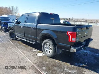 2015 Ford F-150 XLT with VIN 1FTEW1EP0FFC39327, listed as a IAAI auction lot 41012296 with 198,611 mi miles. Bid and sale history available at carsss.com. Image 3.