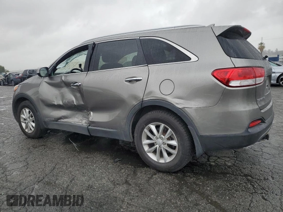2016 Kia Sorento LX z VIN 5XYPGDA57GG162692, wystawiony jako Copart lot #49185585 z przebiegiem 134 152 mil mil oraz Szkoda całkowita • Salvage title. Historia ofert i sprzedaży dostępna na DreamBid. Obrazek 2.