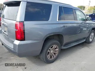 2018 Chevrolet Tahoe LS with VIN 1GNSCAEC2JR306131, listed as a IAAI auction lot 42338873 with 107,652 mi miles and . Bid and sale history available at DreamBid. Image 4.