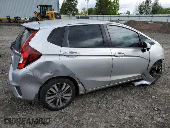 2015 Honda Fit EX-L with VIN 3HGGK5H84FM703169, listed as a Copart auction lot 57472305 with 176,377 mi miles and Salvage title. Bid and sale history available at DreamBid. Image 3.