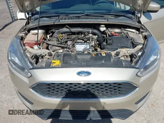 2018 Ford Focus SE z VIN 1FADP3FEXJL210905, wystawiony jako IAAI lot #42264105 z przebiegiem 136 499 mil mil oraz . Historia ofert i sprzedaży dostępna na DreamBid. Obrazek 10.