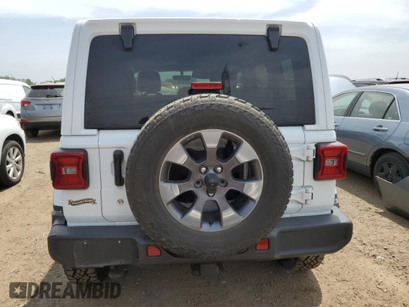 2018 Jeep Wrangler Unlimited Sahara z VIN 1C4HJXEG5JW165071, wystawiony jako Copart lot #59302865 z przebiegiem Nie podano mil oraz Czysty tytuł • Clean title. Historia ofert i sprzedaży dostępna na DreamBid. Obrazek 6.