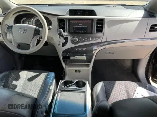 2014 Toyota Sienna SE with VIN 5TDXK3DC3ES441544, listed as a Copart auction lot 50452775 with 230,704 mi miles and Clean Title. Bid and sale history available at DreamBid. Image 9.