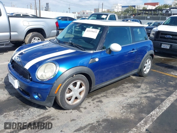 2009 MINI Hardtop with VIN WMWMF335X9TW71208, listed as a IAAI auction lot 41535653 with 148,660 mi miles and . Bid and sale history available at DreamBid. Image 2.