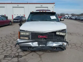 1993 GMC Sierra 1500 with VIN 2GDEK19K3P1548269, listed as a IAAI auction lot 41649617 with 251,363 mi miles and . Bid and sale history available at DreamBid. Image 13.