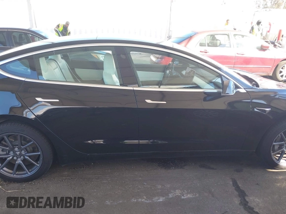2020 Tesla Model 3 Standard Range Plus with VIN 5YJ3E1EA8LF661982, listed as a IAAI auction lot 41700109 with 30,271 mi miles and . Bid and sale history available at DreamBid. Image 12.