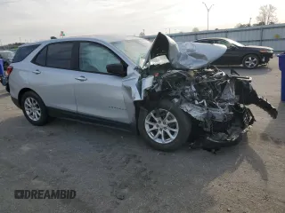 2020 Chevrolet Equinox LS z VIN 2GNAXHEV6L6171261, wystawiony jako Copart lot #49866745 z przebiegiem 218 045 mil mil oraz Szkoda całkowita • Salvage title. Historia ofert i sprzedaży dostępna na DreamBid. Obrazek 4.