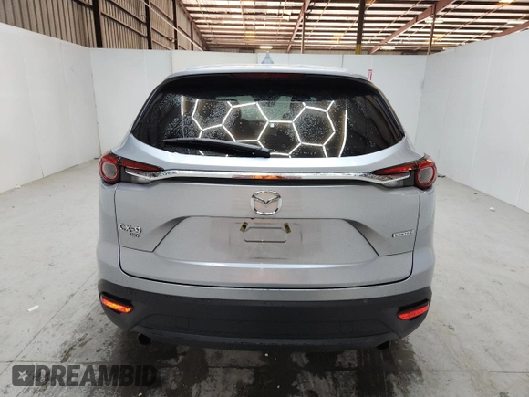 2023 Mazda CX-9 Touring with VIN JM3TCBCY9P0656636, listed as a Copart auction lot 64243905 with 59,788 mi miles and Non repairable. Bid and sale history available at DreamBid. Image 6.