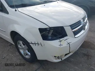 2010 Dodge Grand Caravan SXT with VIN 2D4RN5D17AR444818, listed as a IAAI auction lot 40941591 with Not Provided miles and . Bid and sale history available at DreamBid. Image 6.