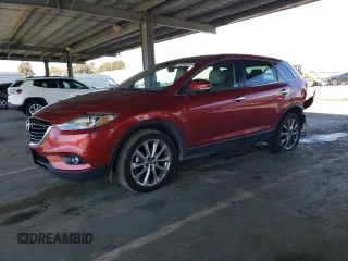 2014 Mazda CX-9 Grand Touring z VIN JM3TB2DVXE0439729, wystawiony jako Copart lot #49188875 z przebiegiem 113 839 mil mil oraz Szkoda całkowita • Salvage title. Historia ofert i sprzedaży dostępna na DreamBid. Obrazek 1.