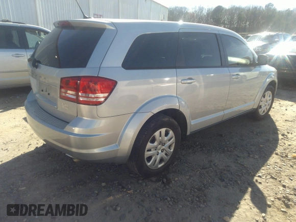 2014 Dodge Journey American Value Pkg with VIN 3C4PDCAB2ET186199, listed as a IAAI auction lot 41594478 with 145,936 mi miles. Bid and sale history available at carsss.com. Image 4.