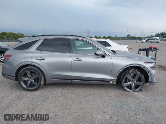 2023 Genesis GV70 Sport with VIN KMUMCDTC1PU098851, listed as a IAAI auction lot 41864774 with 15,016 mi miles and . Bid and sale history available at DreamBid. Image 13.