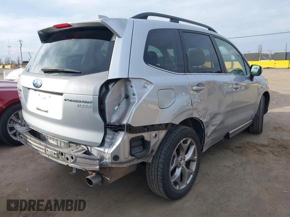 2016 Subaru Forester 2.5i Touring with VIN JF2SJAXCXGH522837, listed as a IAAI auction lot 41562541 with 106,720 mi miles. Bid and sale history available at carsss.com. Image 4.