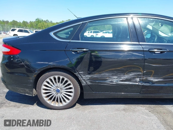 2016 Ford Fusion Titanium with VIN 3FA6P0K9XGR158234, listed as a IAAI auction lot 42043716 with 161,164 mi miles. Bid and sale history available at carsss.com. Image 18.
